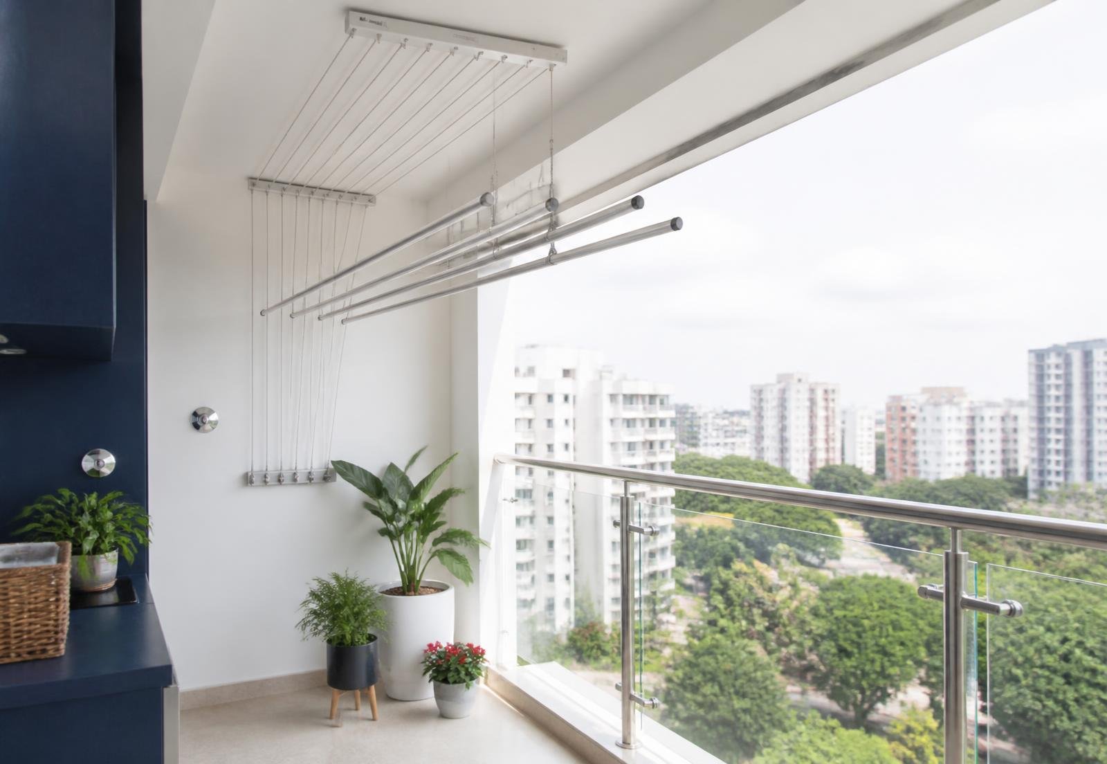 Premium ceiling-mounted cloth drying system installed in a modern Bangalore apartment balcony